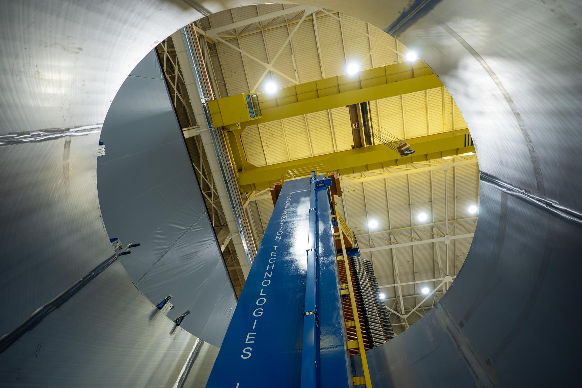 These images show the spacer that will be used on NASA’s (SLS) Space Launch System for the Artemis III mission. At NASA’s Marshall Space Flight Center in Huntsville, Alabama, technicians complete the eighth and final friction stir weld on the barrel section. With the barrel now removed from the Vertical Weld Tool, inspections are underway. The next major milestone will be the installation of the top and bottom rings. The spacer will take the place of the interim cryogenic propulsion stage (ICPS) on Artemis III, with the ICPS reassigned for use on the Artemis IV mission.
